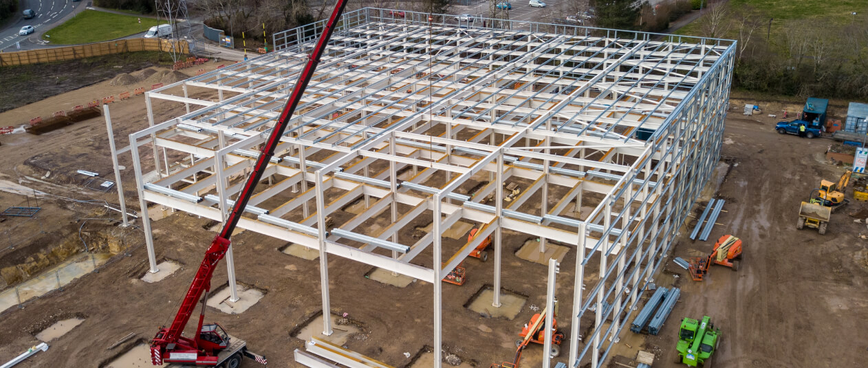 Steel structure drone shot with red crane