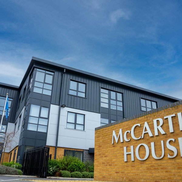 Low angle view of McCarthy houses sign 